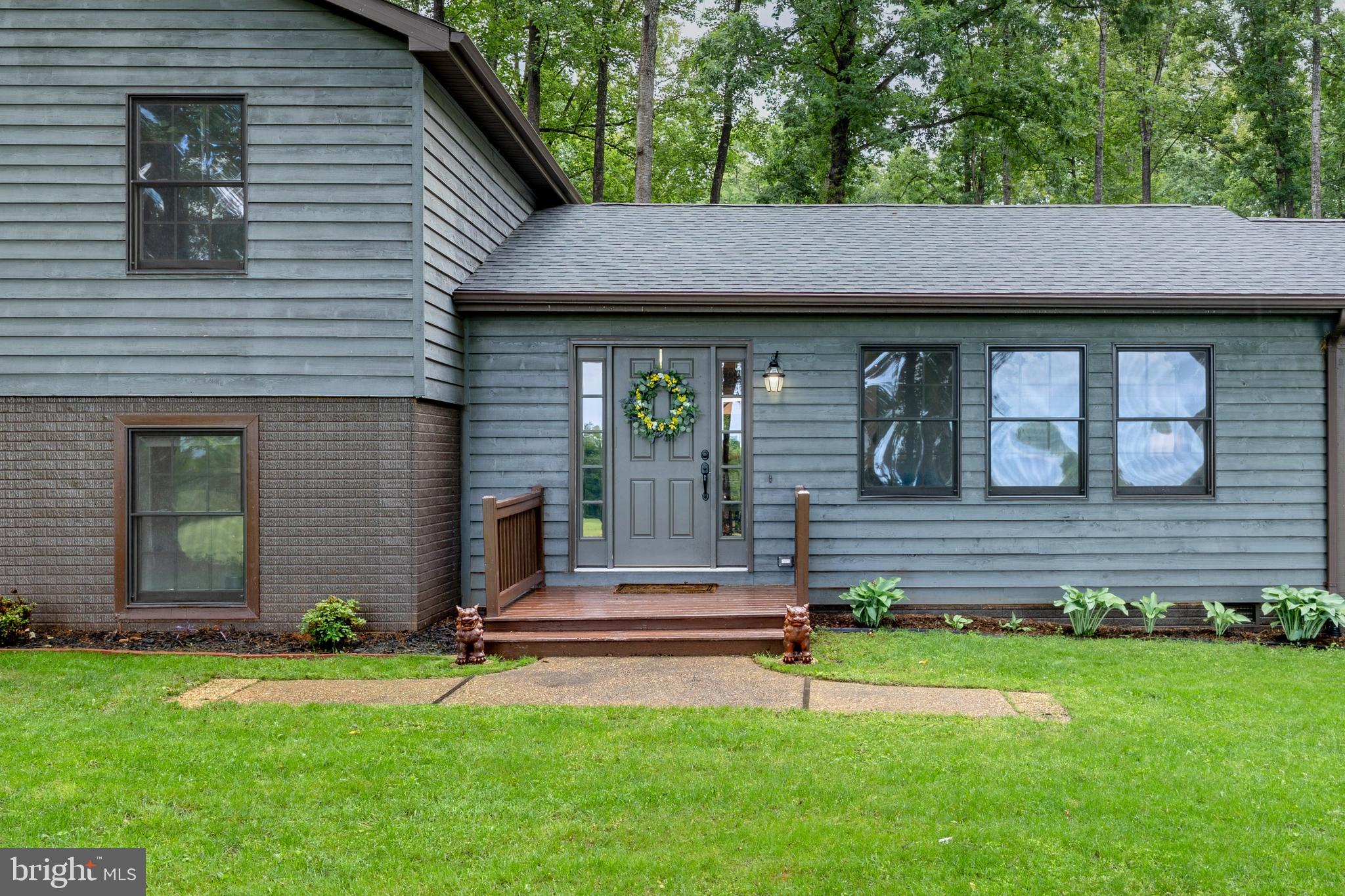 1425 Jacks Shop Road Rochelle, VA 22738 - Photo 6 of 56 a backyard of a house with wooden floor and fence