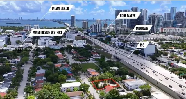 a sign that is sitting in front of a building