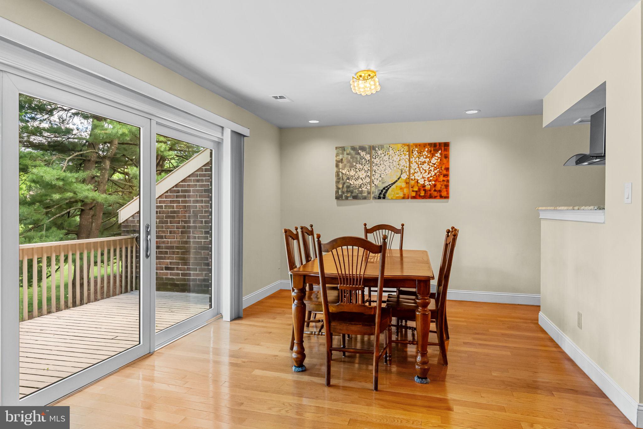 14 Elan Lane Chesterbrook, PA 19087 - Photo 8 of 31 Bright dining area with outdoor views.