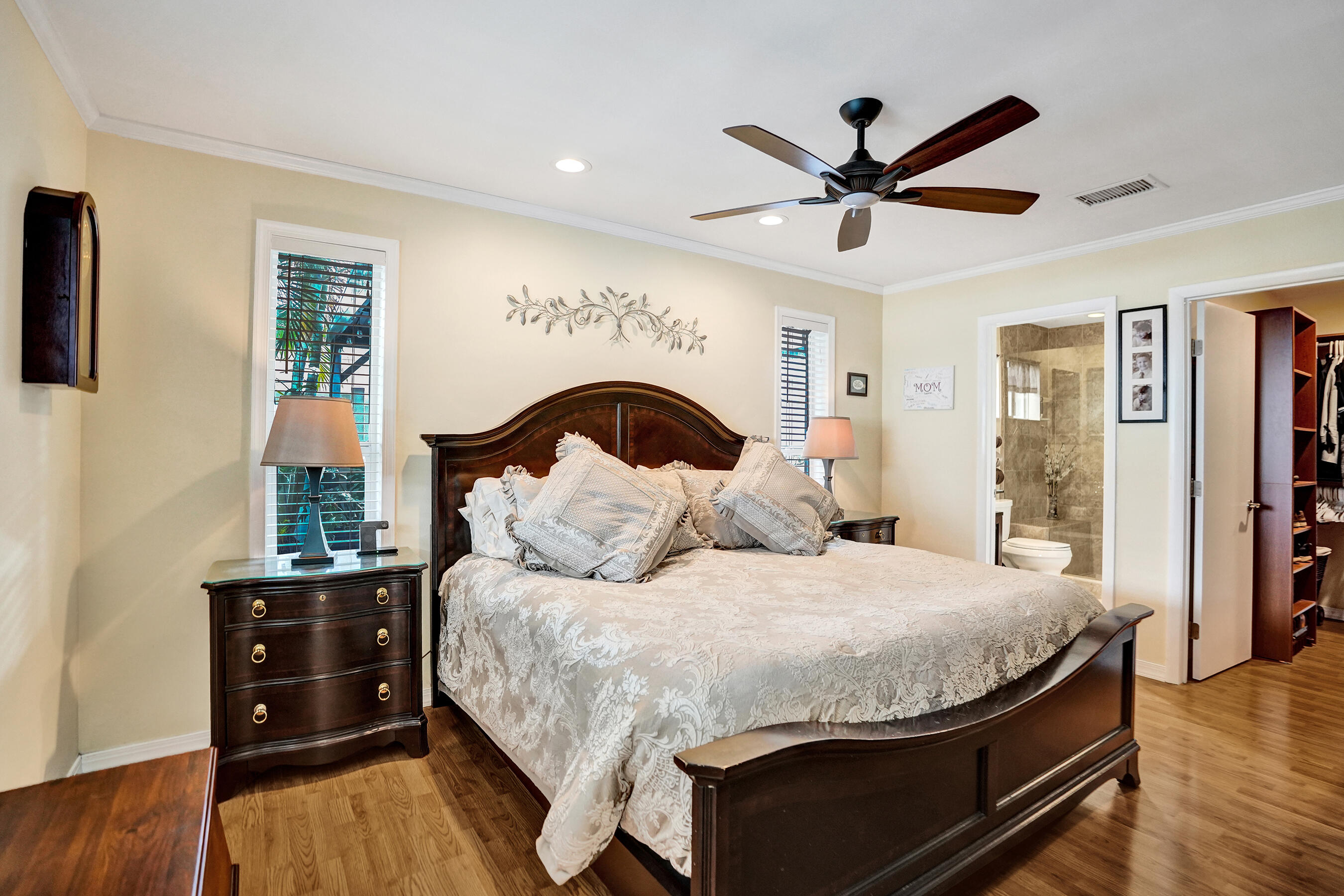 3001 Northeast 45th Street Lighthouse Point, FL 33064 - Photo 21 of 67 a bedroom with a bed and wooden floor