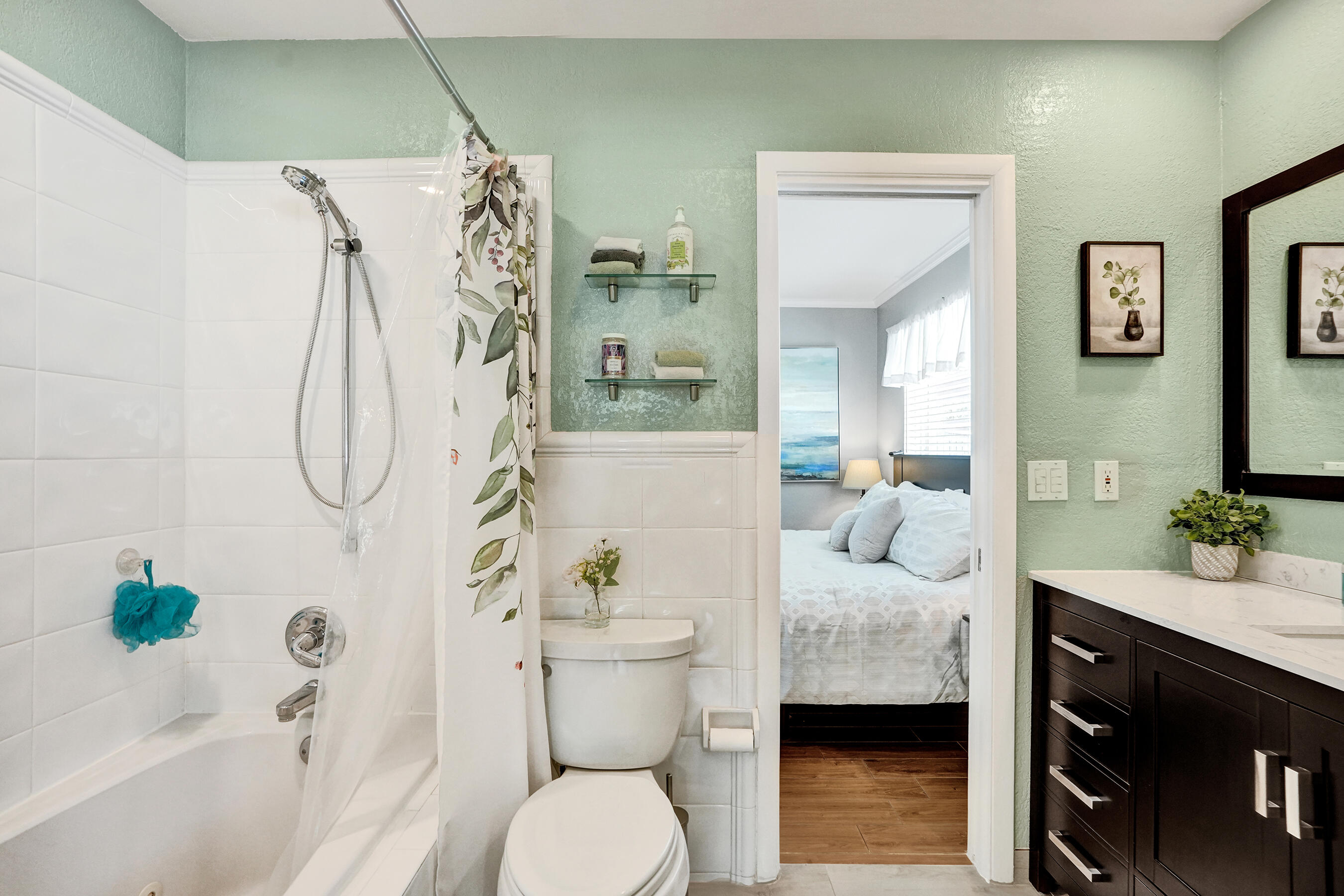3001 Northeast 45th Street Lighthouse Point, FL 33064 - Photo 34 of 67 a bathroom with a granite countertop sink a toilet and shower