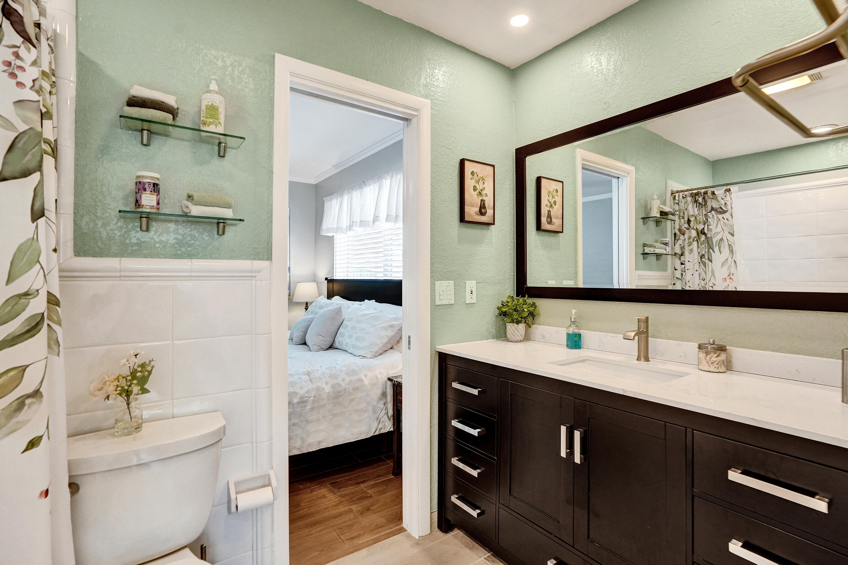 3001 Northeast 45th Street Lighthouse Point, FL 33064 - Photo 35 of 67 a bedroom with a bed and a dresser