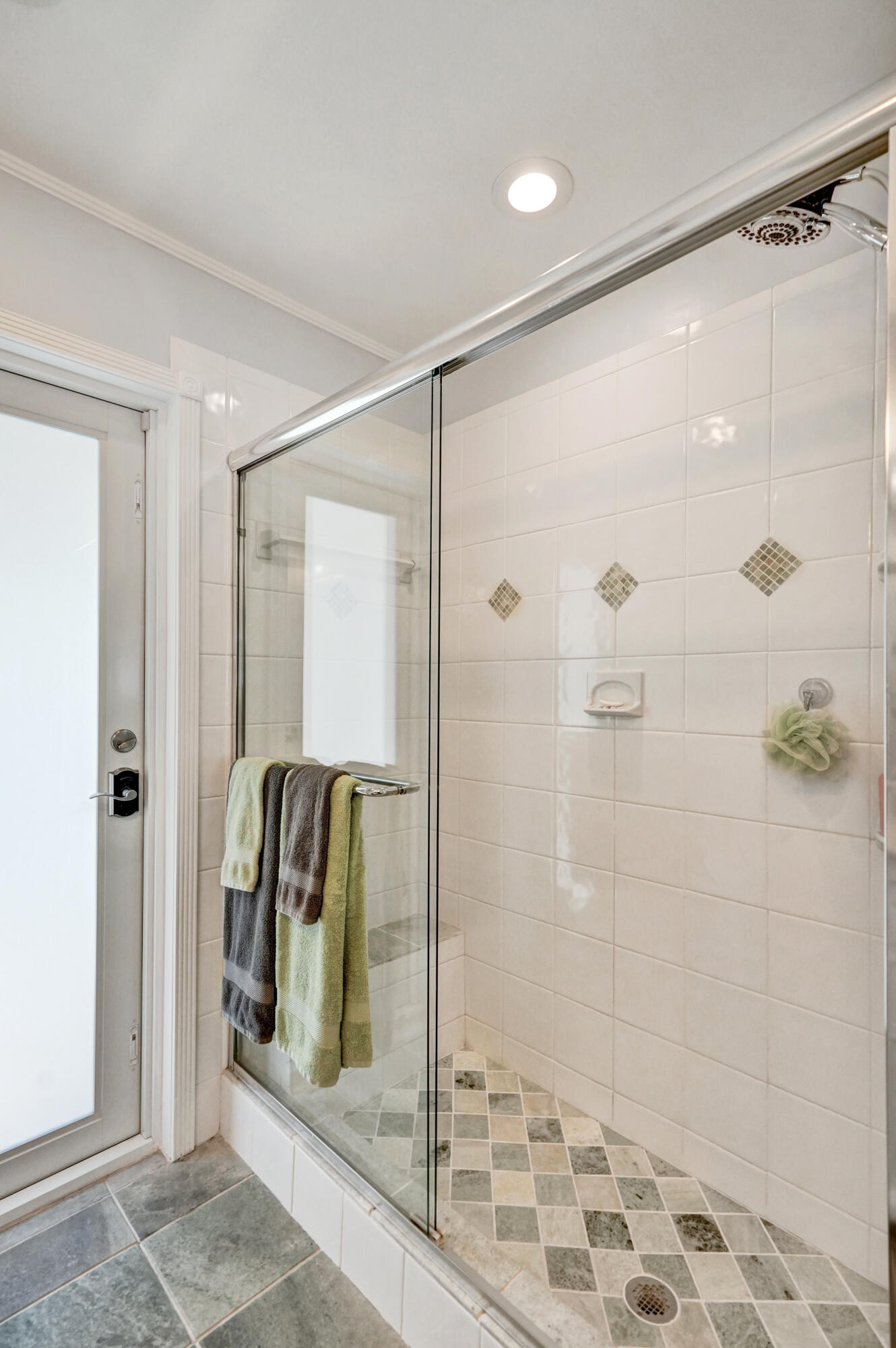 3001 Northeast 45th Street Lighthouse Point, FL 33064 - Photo 42 of 67 a bathroom with a glass shower door