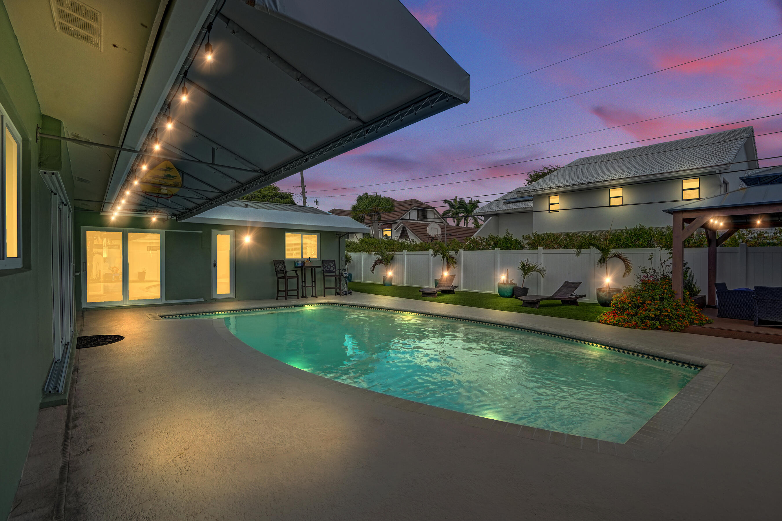 3001 Northeast 45th Street Lighthouse Point, FL 33064 - Photo 47 of 67 a view of an chairs and table in the patio