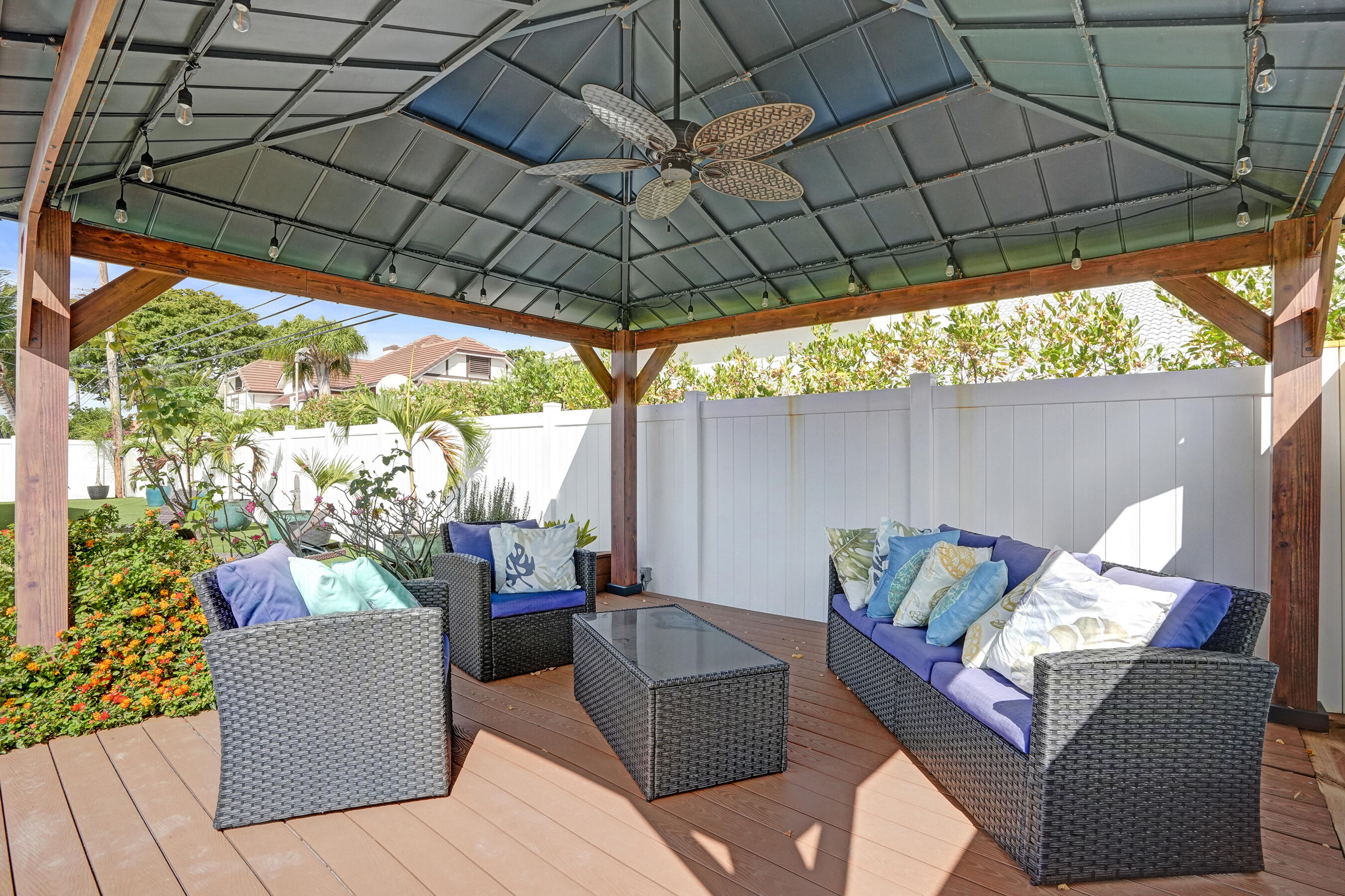 3001 Northeast 45th Street Lighthouse Point, FL 33064 - Photo 56 of 67 a outdoor living space with furniture and garden view