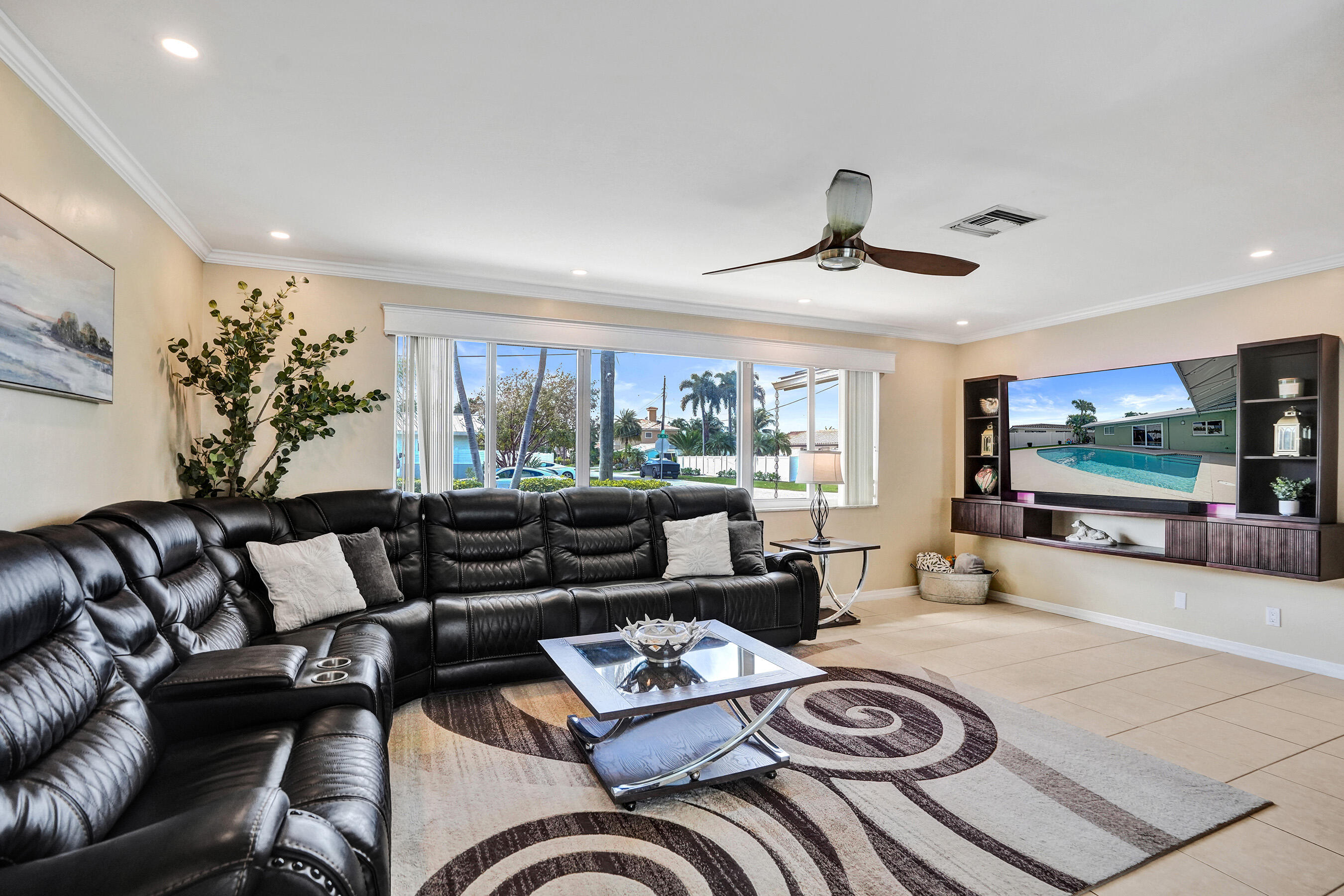 3001 Northeast 45th Street Lighthouse Point, FL 33064 - Photo 7 of 67 a living room with furniture and a flat screen tv