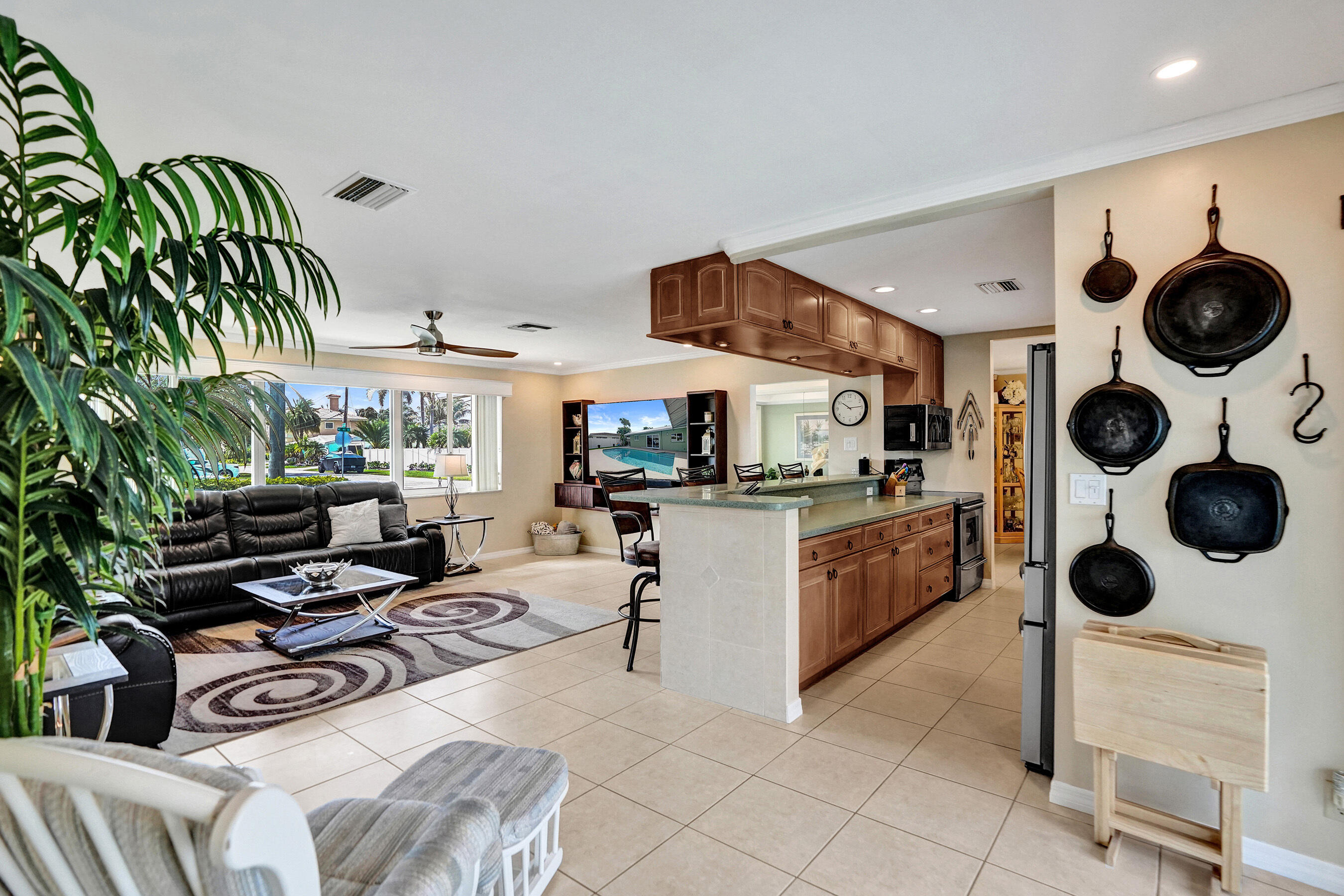 3001 Northeast 45th Street Lighthouse Point, FL 33064 - Photo 8 of 67 a living room with furniture and a flat screen tv
