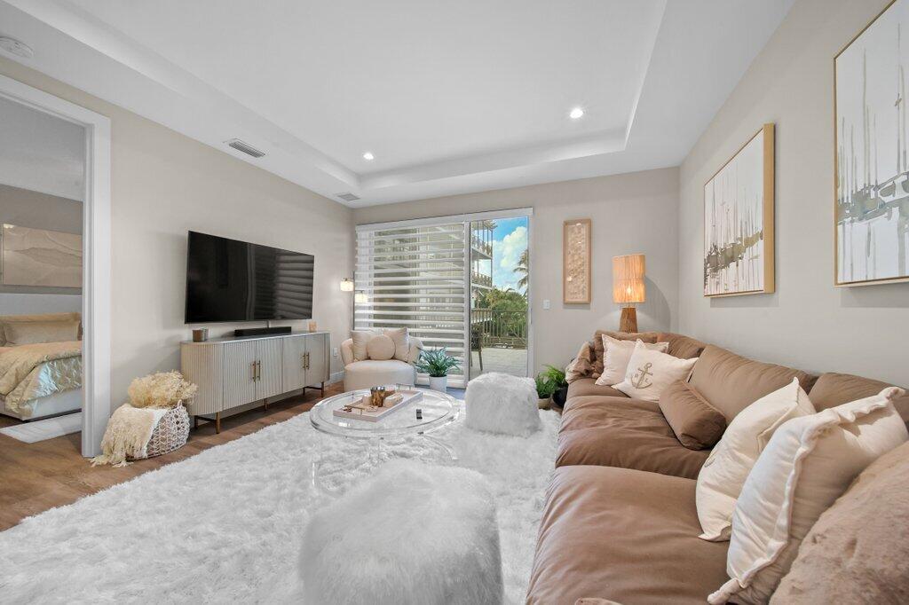 41 Southwest Seminole Street, Unit 205 Stuart, FL 34994 - Photo 10 of 35 living1.jpg-SMALL