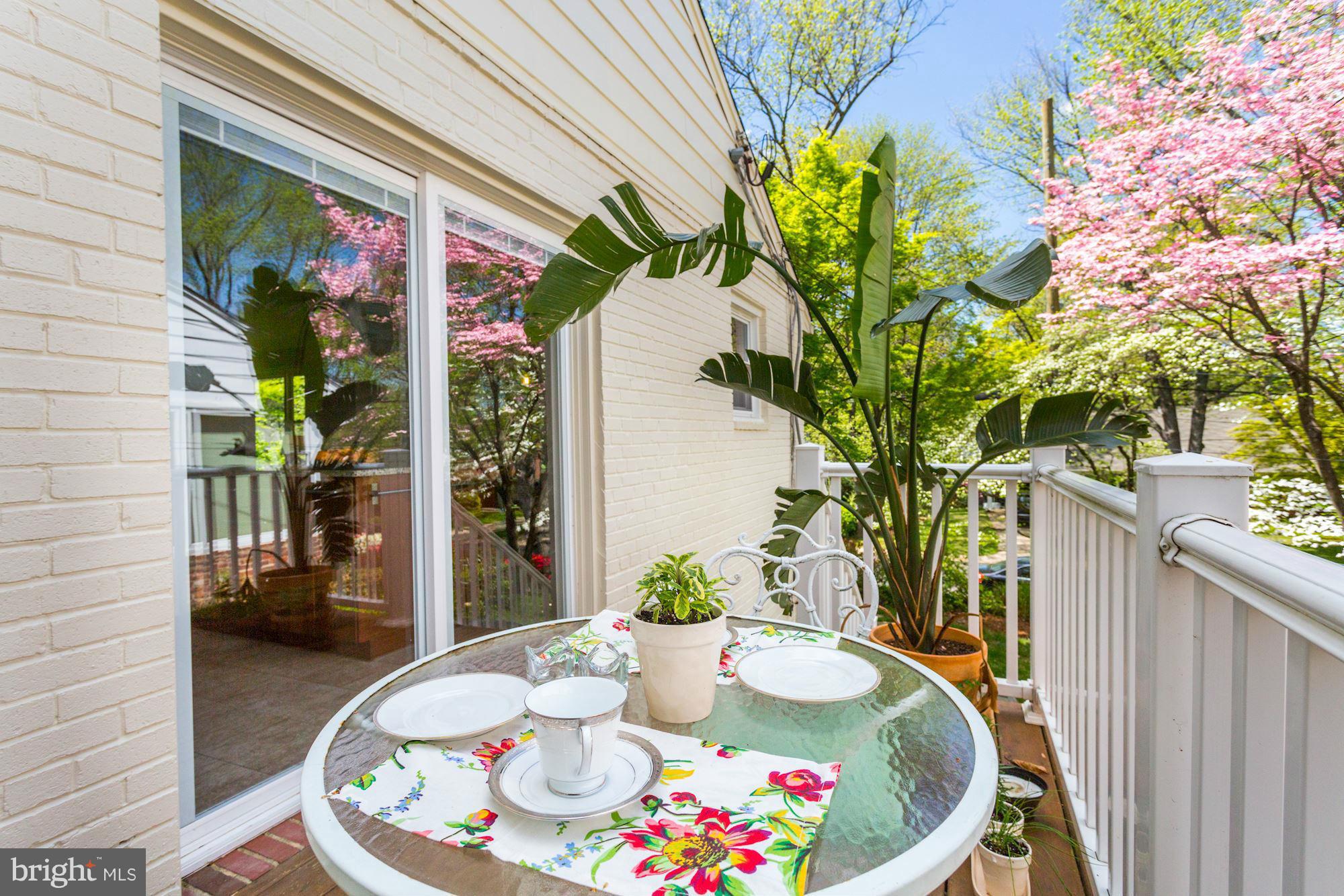 5011 Rodman Road Bethesda, MD 20816 - Photo 5 of 25 a dining room with furniture and wooden floor