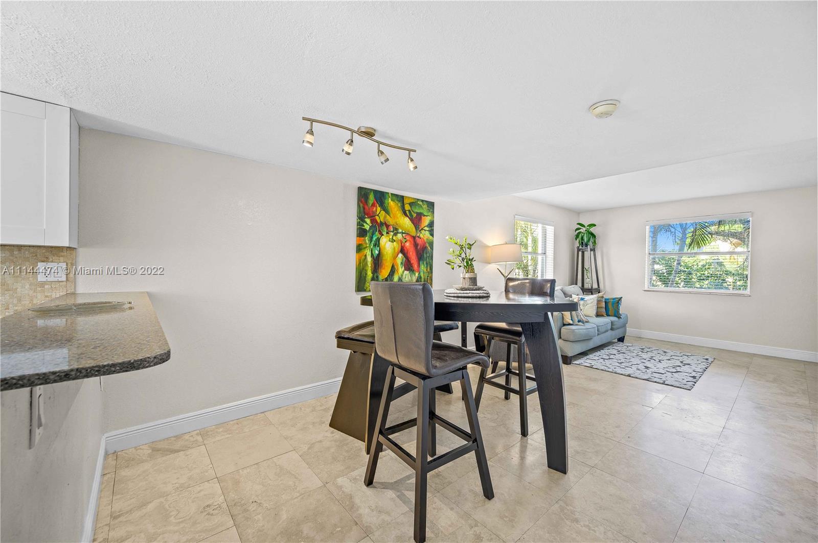 4600 Southwest 67th Avenue, Unit 240 Miami, FL 33155 - Photo 5 of 20 a view of a dining room with furniture