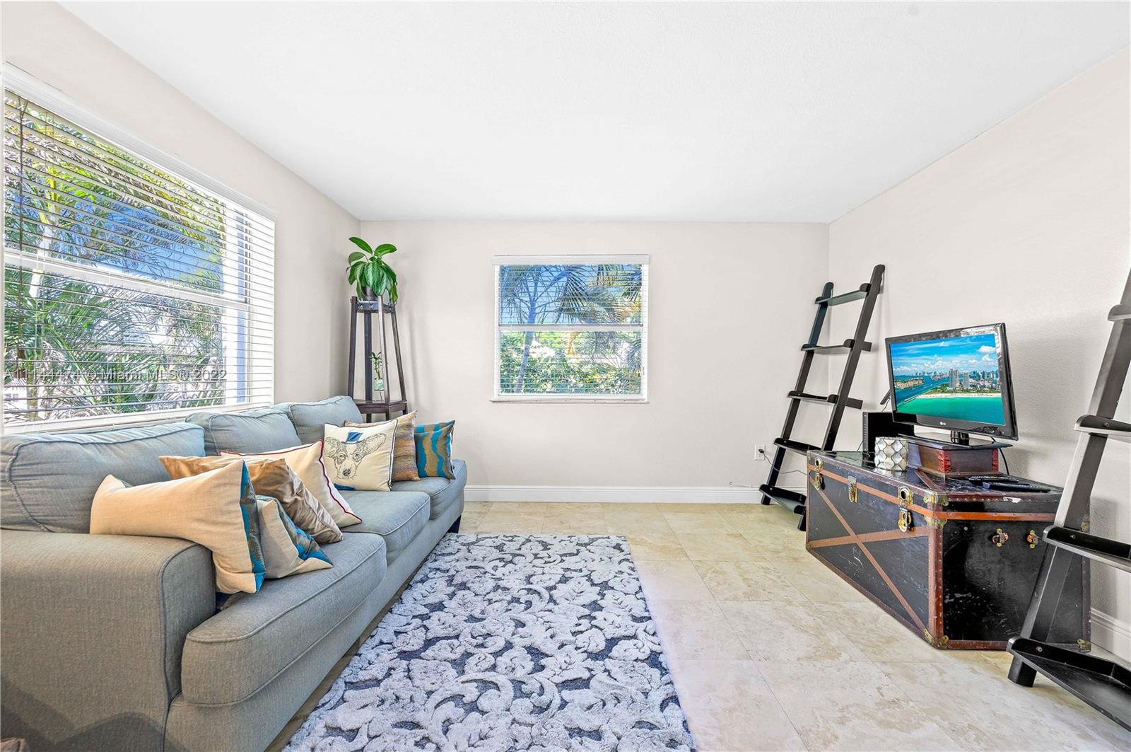 4600 Southwest 67th Avenue, Unit 240 Miami, FL 33155 - Photo 7 of 20 a living room with furniture and a window