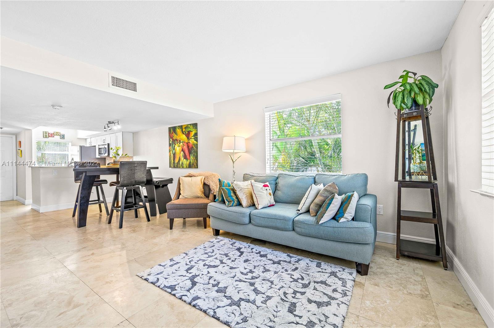 4600 Southwest 67th Avenue, Unit 240 Miami, FL 33155 - Photo 8 of 20 a living room with furniture and a large window