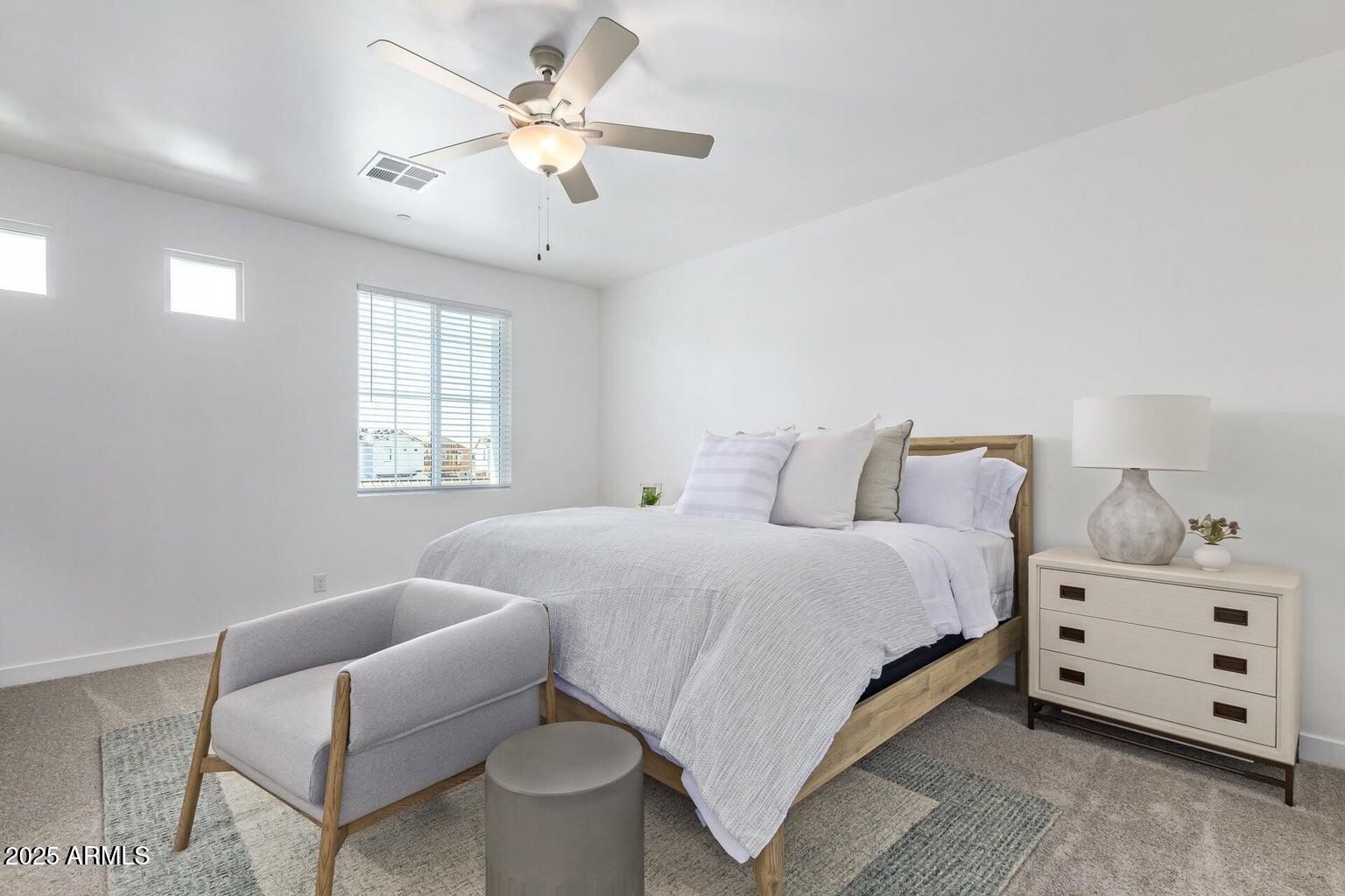 3230 East Thomas Road, Unit 114 Mesa, AZ 85213 - Photo 15 of 27 a bedroom with bed and window