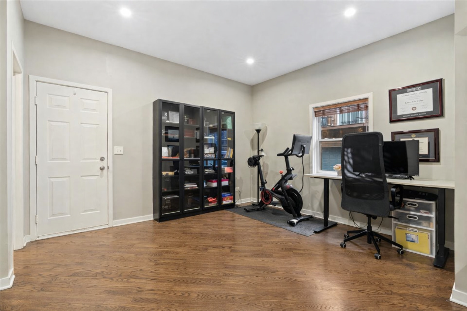 1012 South Loomis Street, Unit D Chicago, IL 60607 - Photo 14 of 17 a view of a livingroom with workspace and a couch