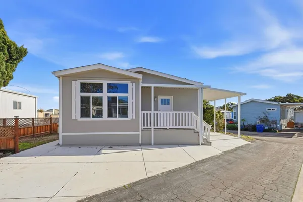 a front view of a house with a garage
