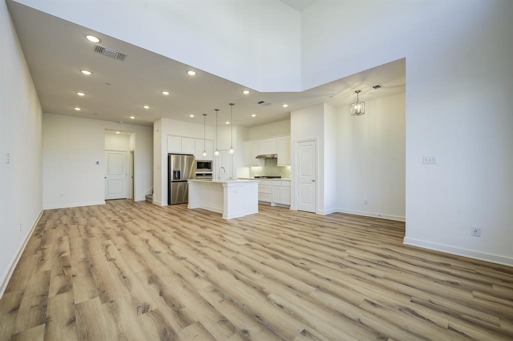 3708 Queen Road Sherman, TX 75090 - Photo 12 of 40 a view of large kitchen with kitchen island sink and refrigerator