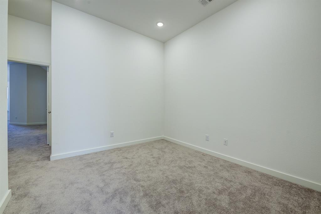 3708 Queen Road Sherman, TX 75090 - Photo 26 of 40 an empty room with a workbench