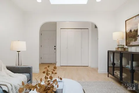 a bedroom with a bed and a lamp