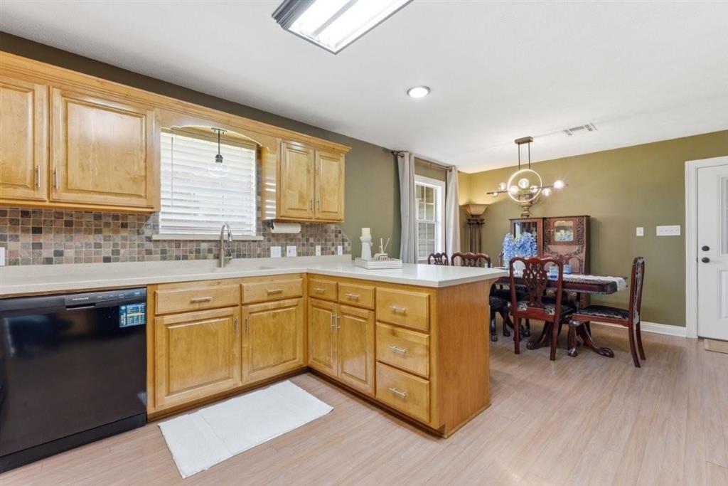 1304 Theriot Road Lake Charles, LA 70611 - Photo 3 of 35 Kitchen; Breakfast Bar; Dining Area