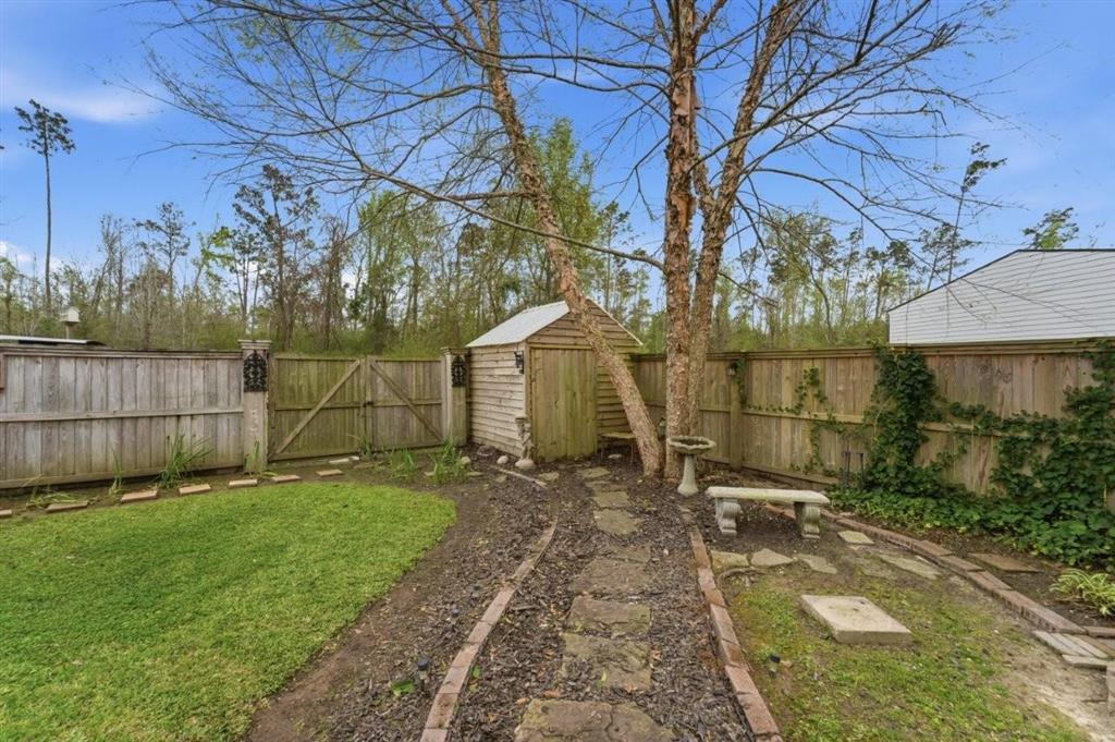 1304 Theriot Road Lake Charles, LA 70611 - Photo 34 of 35 Courtyard; partially privacy fenced area.