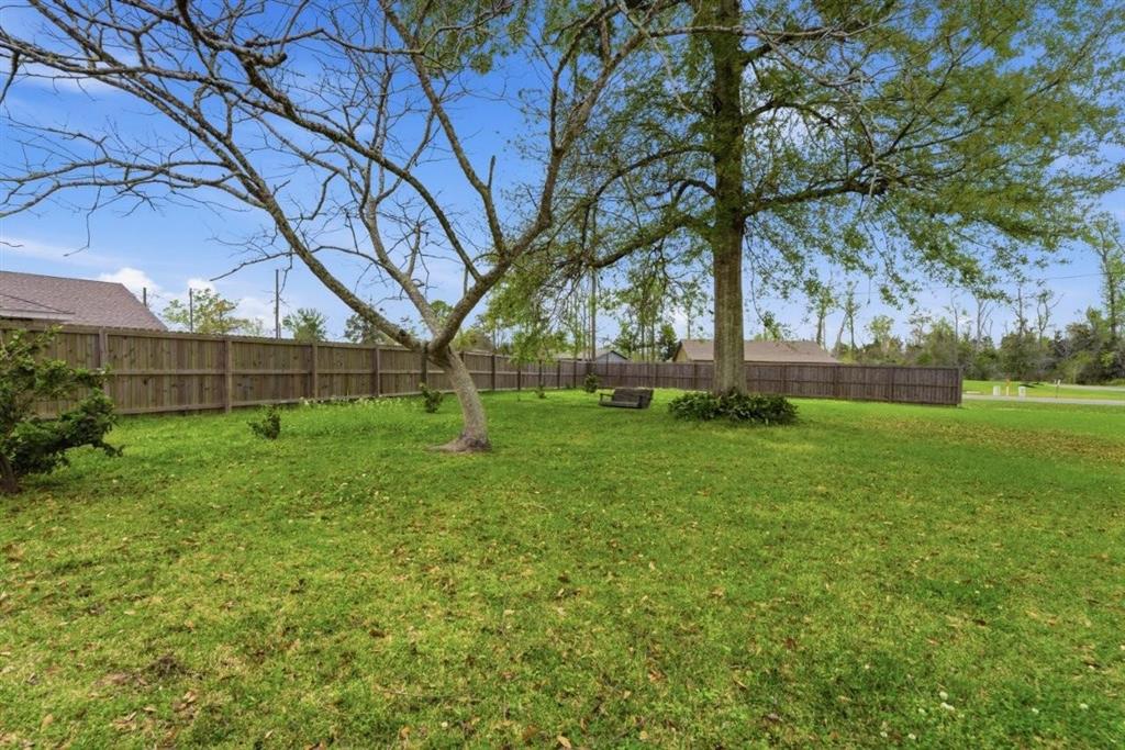 1304 Theriot Road Lake Charles, LA 70611 - Photo 35 of 35 Additional yard located outside of the partially privacy fenced courtyard area.