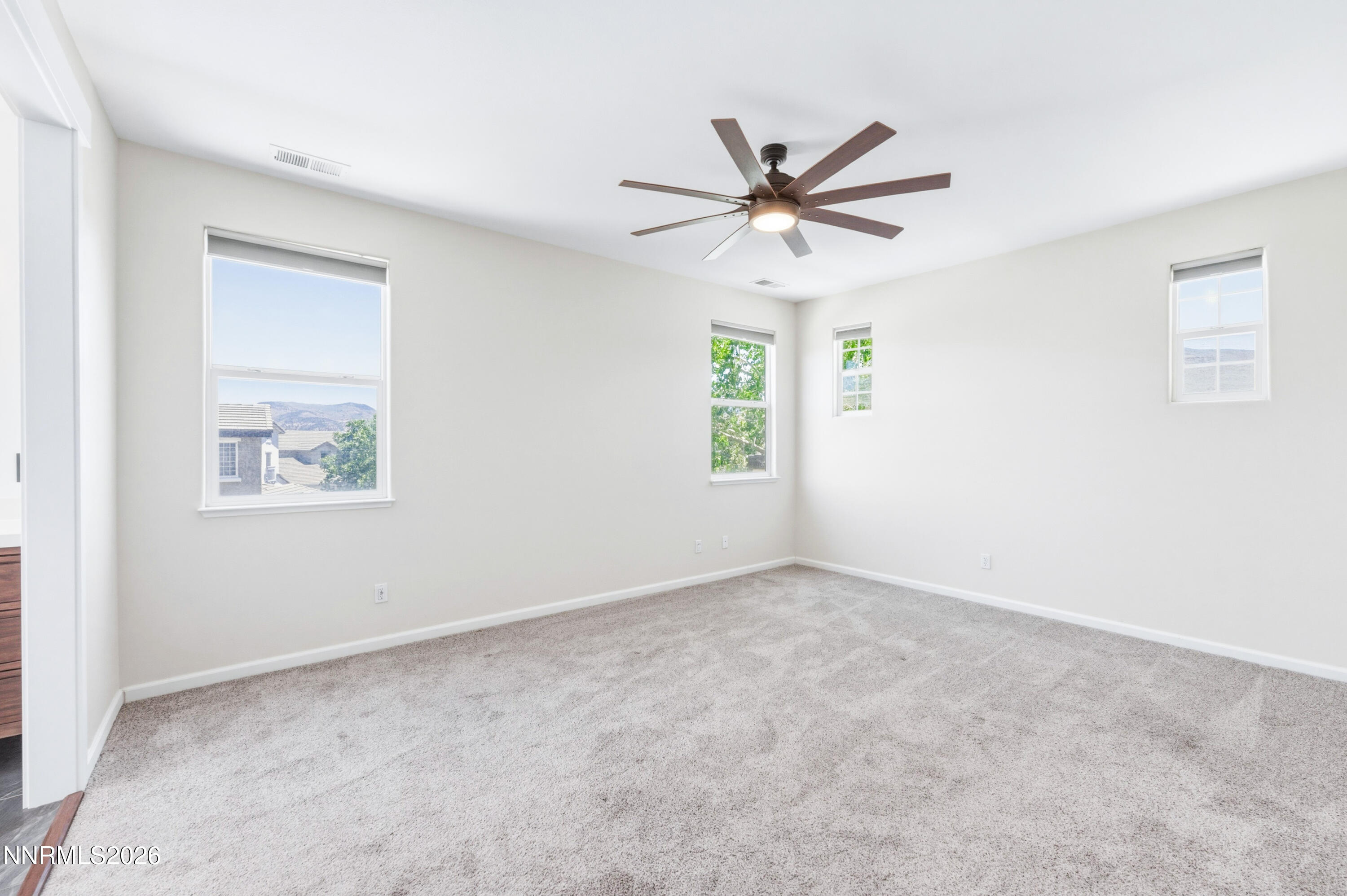 1770 Kodiak Circle Reno, NV 89511 - Photo 18 of 32 an empty room with windows and fan