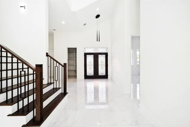 an aerial view of a city with lots of residential buildings