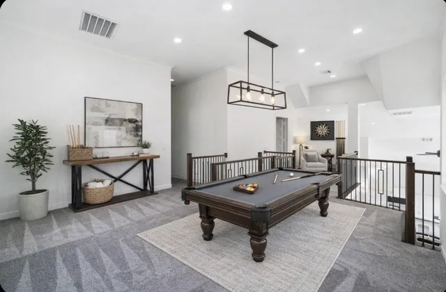 a view of a hallway with windows