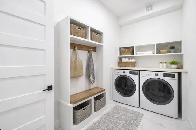 a large kitchen with kitchen island granite countertop a stove a sink and a granite counter tops