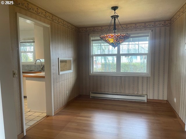 2620 North 23rd Street Springfield, OR 97477 - Photo 13 of 24 a view of livingroom with hardwood floor and window