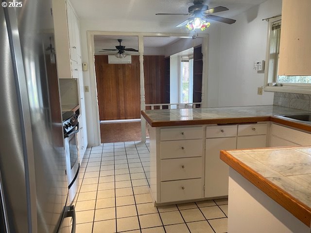 2620 North 23rd Street Springfield, OR 97477 - Photo 10 of 24 a kitchen with a sink a counter space and cabinets