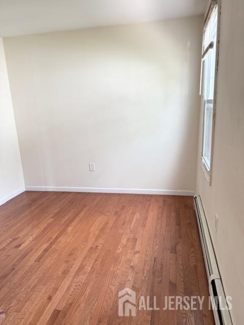424 South 8th Avenue Highland Park, NJ 08904 - Photo 6 of 13 a view of an empty room