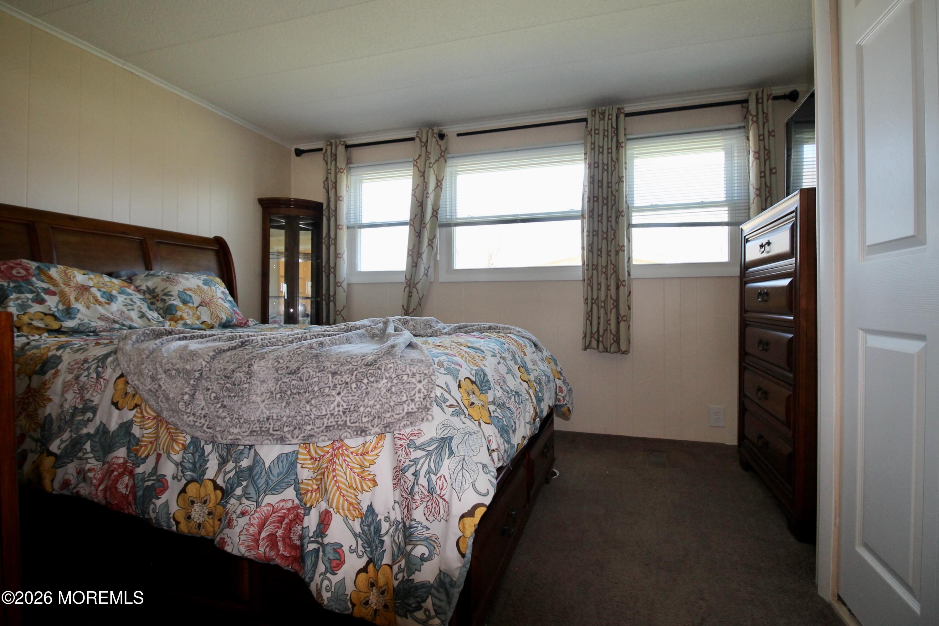 623 Sara Drive Freehold, NJ 07728 - Photo 20 of 28 a bedroom with a bed and a window