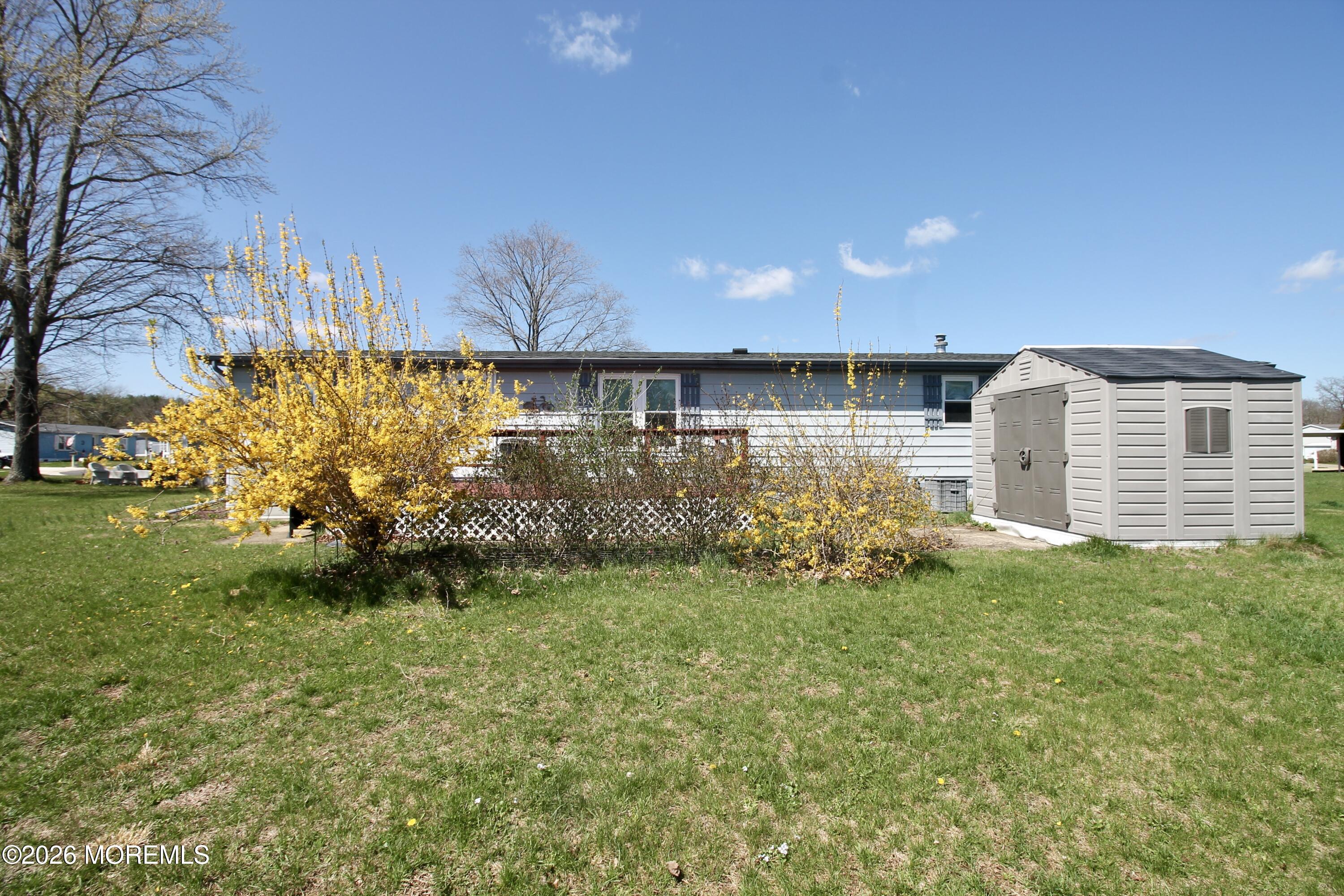 623 Sara Drive Freehold, NJ 07728 - Photo 23 of 28 a view of a backyard