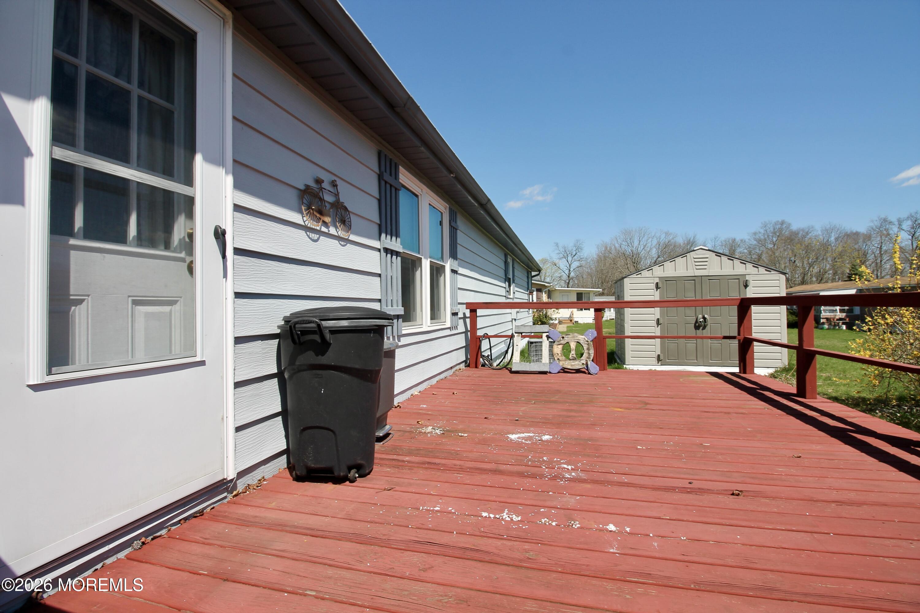 623 Sara Drive Freehold, NJ 07728 - Photo 28 of 28 a view of a balcony with seating space