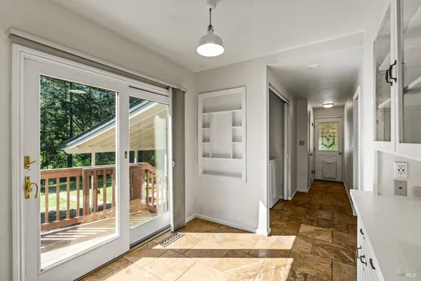 an empty room that has a window