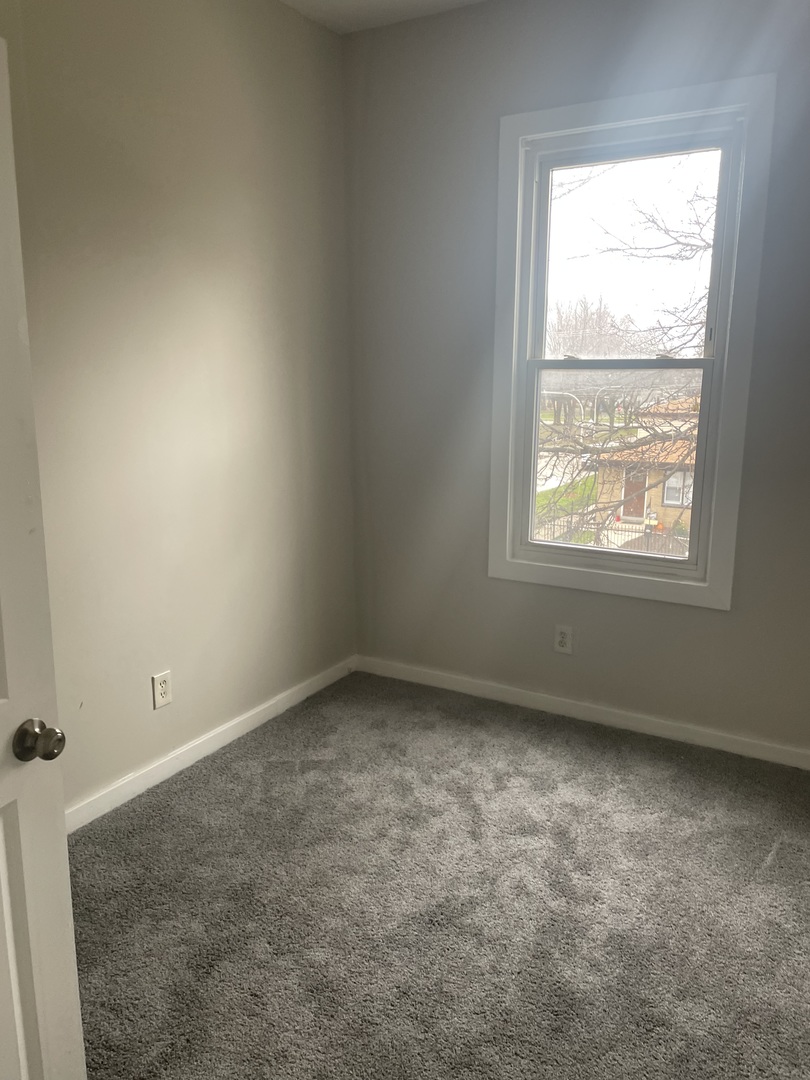5145 South Lowe Avenue Chicago, IL 60609 - Photo 17 of 17 an empty room with a window