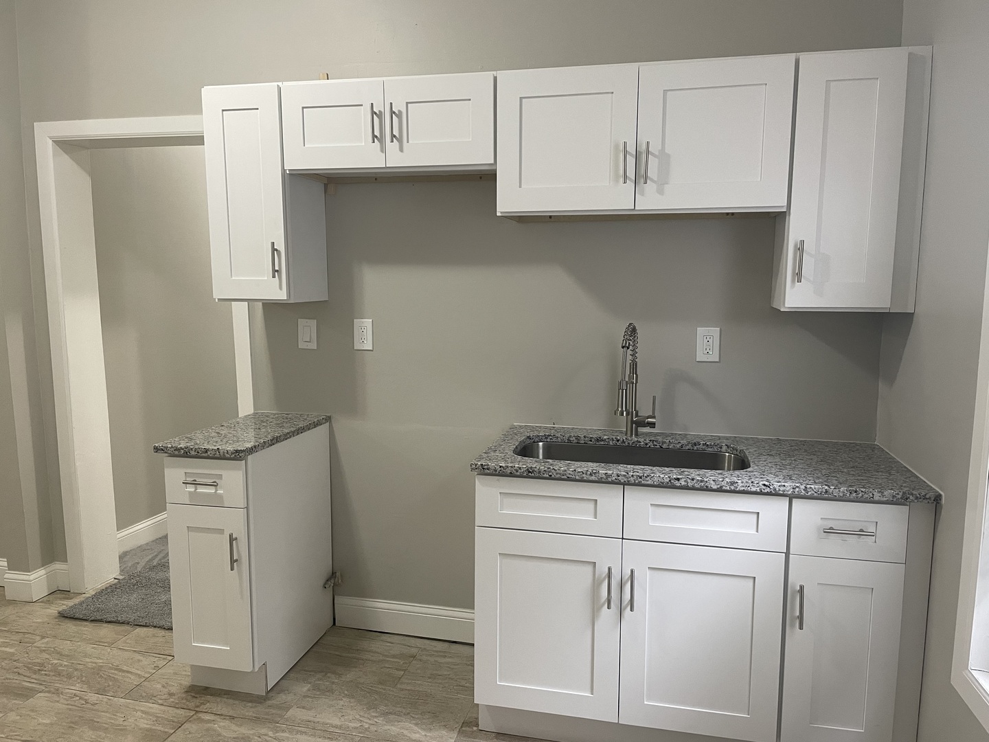 5145 South Lowe Avenue Chicago, IL 60609 - Photo 8 of 17 a kitchen with white cabinets and white appliances