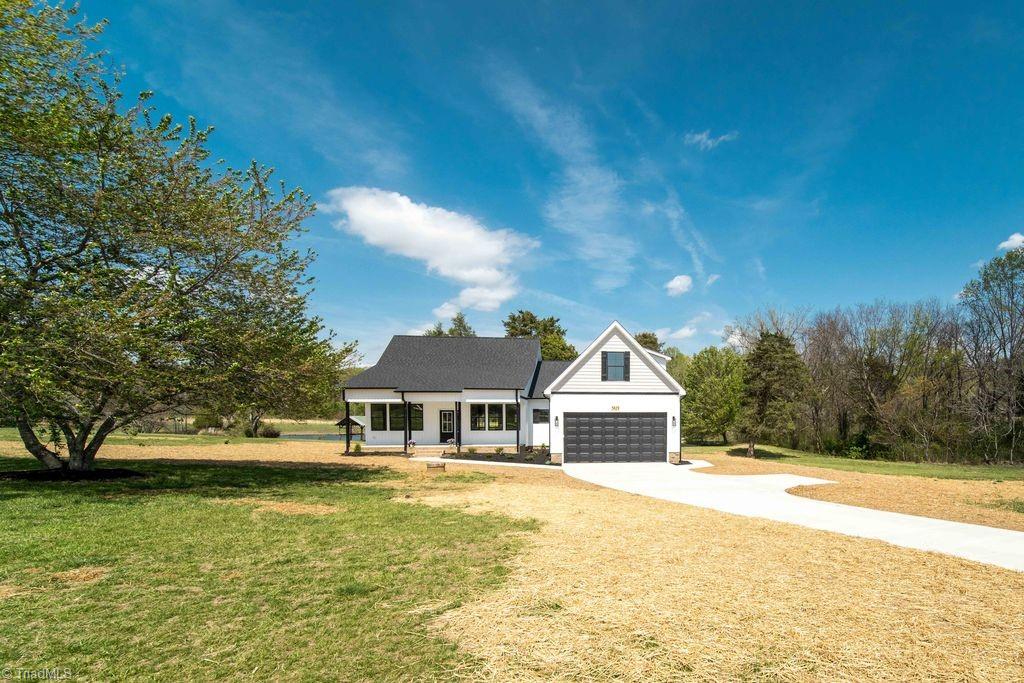 5823 Thacker Dairy Road Whitsett, NC 27377 - Photo 2 of 38