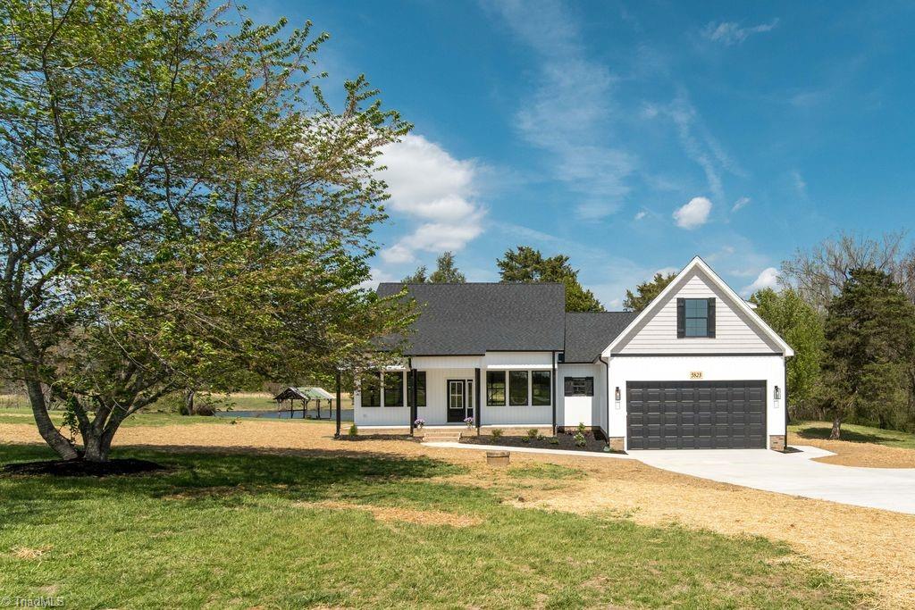 5823 Thacker Dairy Road Whitsett, NC 27377 - Photo 3 of 38