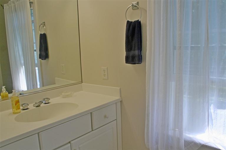 60 Slough Road Brewster, MA 02631 - Photo 11 of 22 a bathroom with a sink and mirror