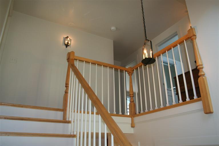 60 Slough Road Brewster, MA 02631 - Photo 12 of 22 a view of staircase with railing and white walls