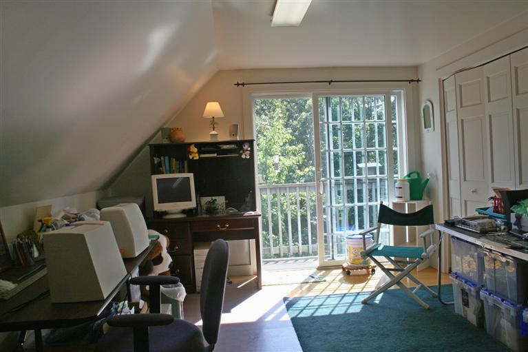 60 Slough Road Brewster, MA 02631 - Photo 13 of 22 a workspace with furniture and a floor to ceiling window