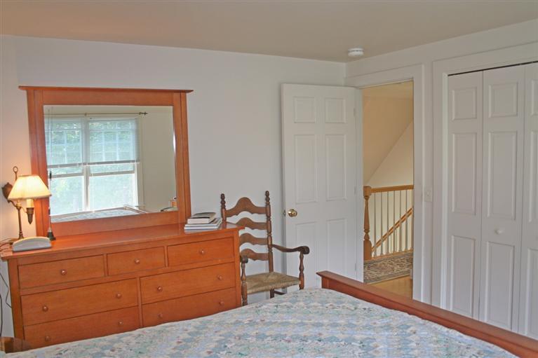 60 Slough Road Brewster, MA 02631 - Photo 15 of 22 a room with a dresser and a window