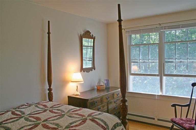 60 Slough Road Brewster, MA 02631 - Photo 16 of 22 a bedroom with a bed and a window