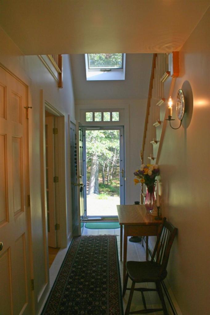 60 Slough Road Brewster, MA 02631 - Photo 2 of 22 a view of a livingroom with furniture and window