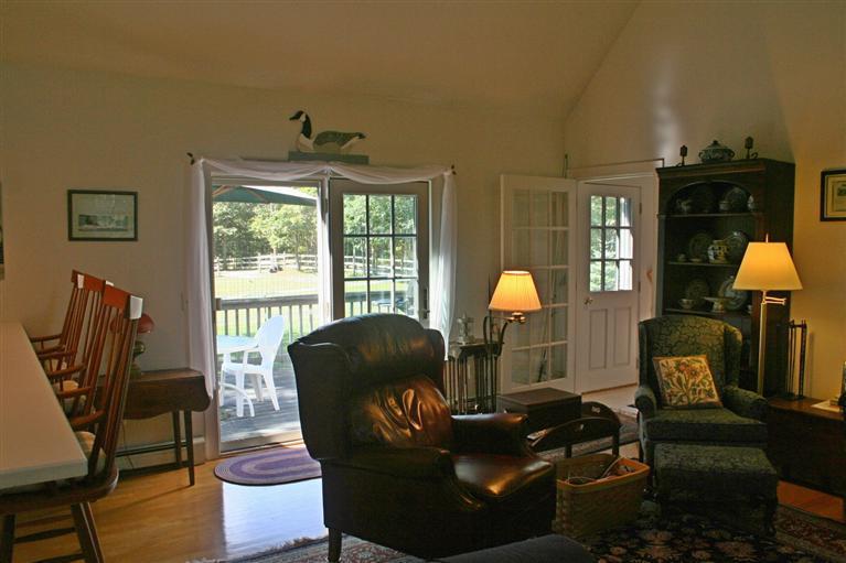 60 Slough Road Brewster, MA 02631 - Photo 4 of 22 a living room with furniture and a window