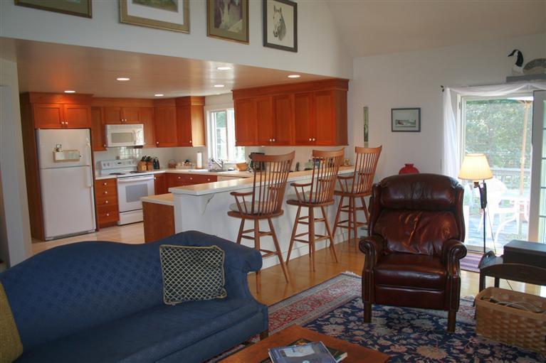 60 Slough Road Brewster, MA 02631 - Photo 6 of 22 a living room with furniture and wooden floor