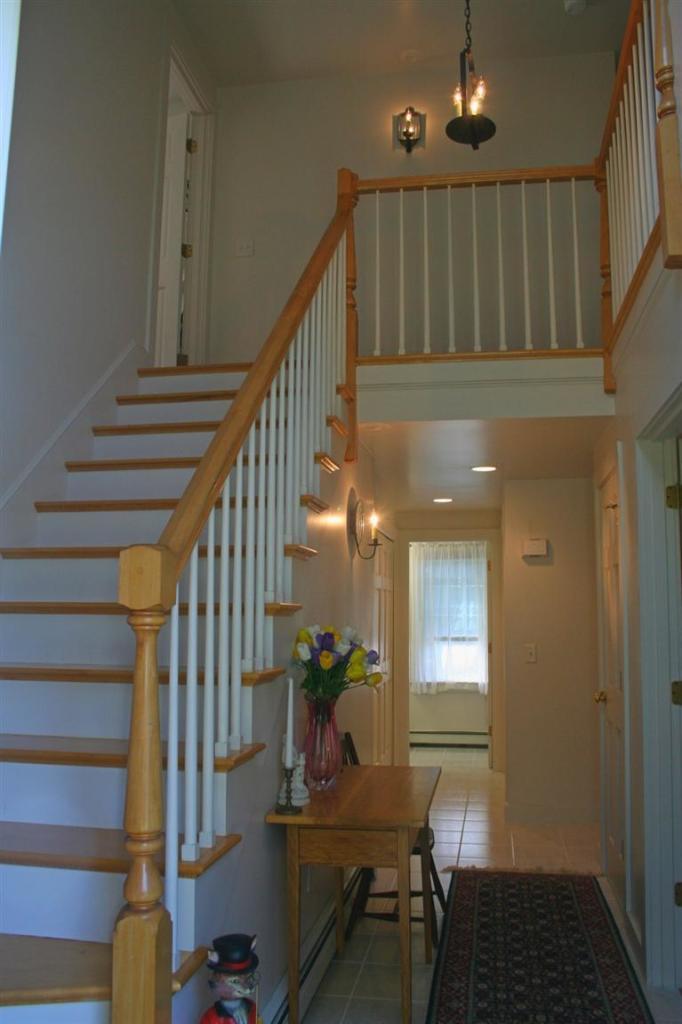60 Slough Road Brewster, MA 02631 - Photo 10 of 22 a view of entryway and hall with wooden floor