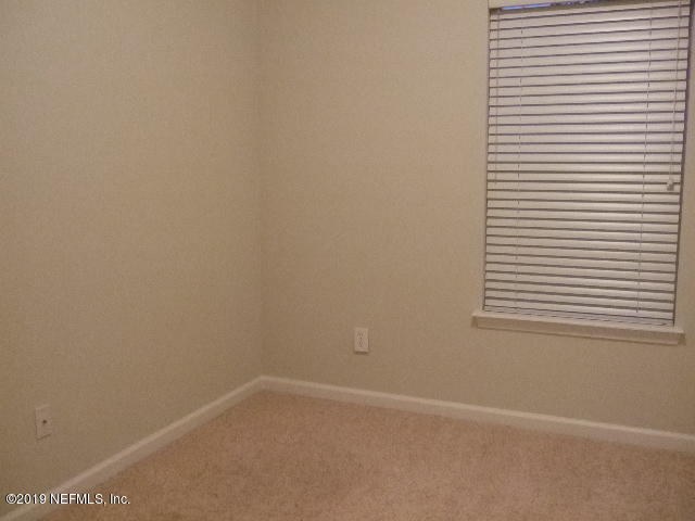 7002 Roundleaf Drive Jacksonville, FL 32258 - Photo 10 of 13 a view of a small space with a window